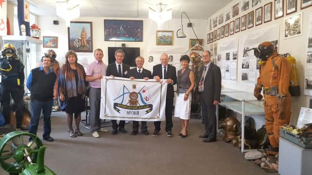 Members of the Diving Museum, Gosport, get a warm welcome from their Russian counterparts in Moscow