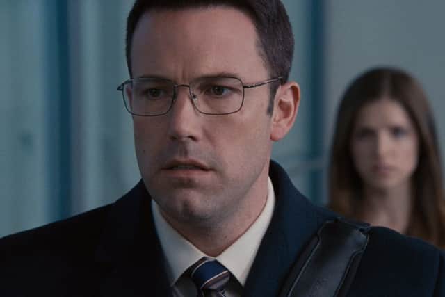 Ben Affleck as Chris Wolff and Anna Kendrick as Dana Cummings. PA Photo/Warner Bros.
