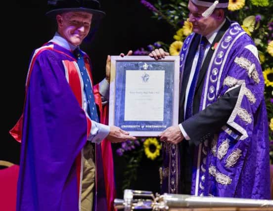 Tim Peake (left) receiving an Honorary Doctorate of Science Degree from the Graham Galbraith (right), Vice-Chancellor of the University of Portsmouth Picture: Christopher Ison/PA Wire