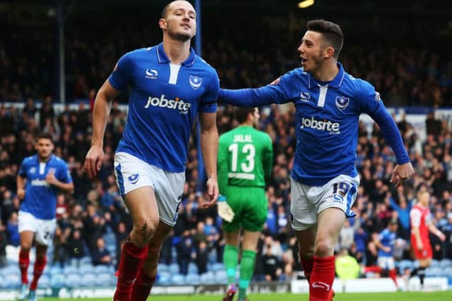 Adam McGurk, left, netted twice in Pompey's last FA Cup first-round outing - a 2-1 Fratton Park win over Macclesfield Town    Picture: Joe Pepler