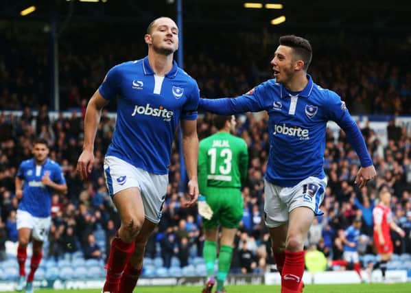 Adam McGurk, left, netted twice in Pompey's last FA Cup first-round outing - a 2-1 Fratton Park win over Macclesfield Town    Picture: Joe Pepler