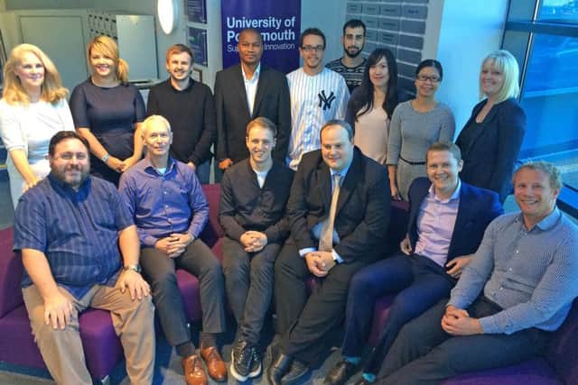 From left at the back, Marie Sabatino, Michelle Soper-Dyer, Lee Bennett, Ibrahima Sory Kaba, Mike Humby, Stavros Michael, Gina Tjhai, Junia Phiong and Carol Barrett. Front, from left, Aniello Sabatino, Paul Simpson, Adam Pool, Pete Outen, Adam Swanson and Mark McGarry