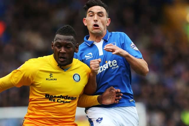 Gary Roberts battles with Aaron Pierre last season. Picture: Joe Pepler