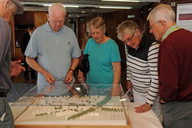 People looking at plans for Welborne at a previous exhibition