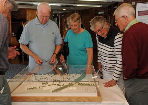 People looking at plans for Welborne at a previous exhibition