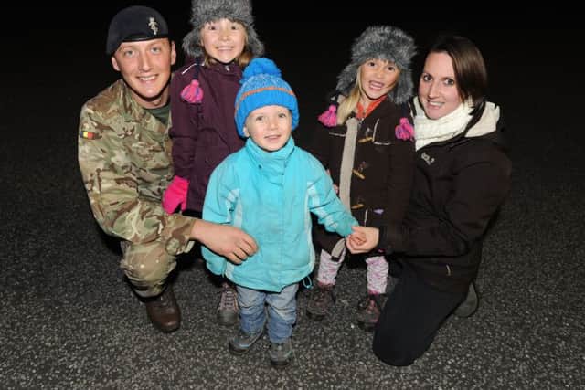 Sgt James Grisley, 32, with wife Stefanie, 29, and from left, children Morgan, seven,  Jack, three, and Rose, four Picture: Sarah Standing (161508-59)