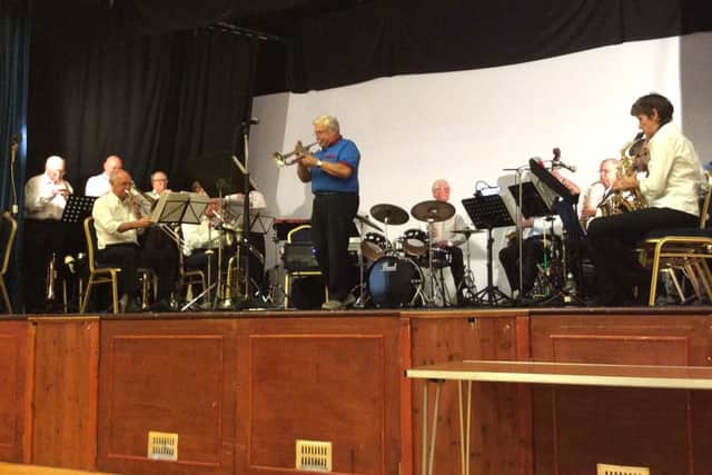 The Sarisbury Green Big Bang performing in aid of Fareport Talking News