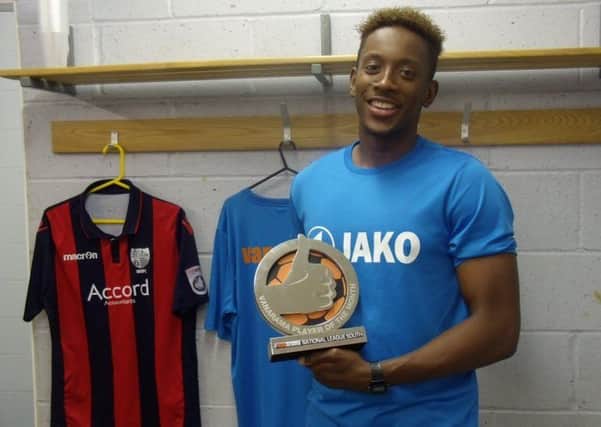 Pompey new-boy Jamal Lowe with his National League South player of the month award for October   Photo: Hampton & Richmond Borough FC
