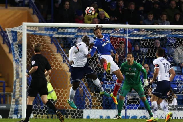 Adebayo Akinfenwa scores the winner at Fratton Park. Picture: Joe Pepler