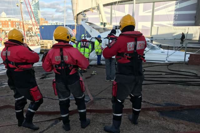 Gosport & Fareham Inshore Rescue Service (Gafirs) help tow the stricken boat safely back to Portsmouth