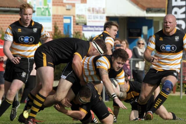 Simon Morgan is tackled. Picture: Mick Young (151341-06)