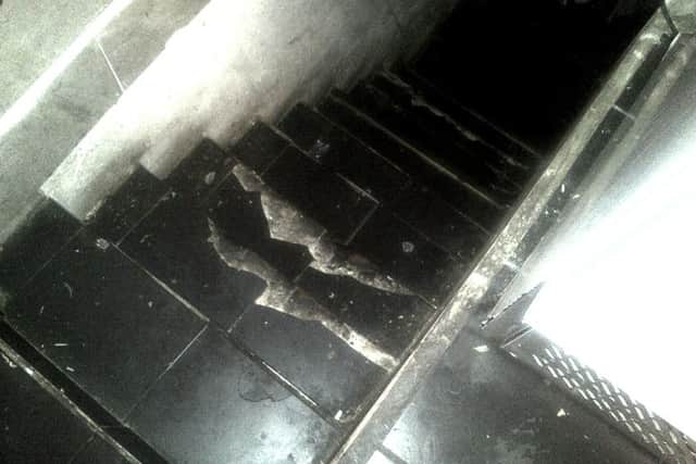 Greasy and brokwn steps leading to the cellar at Seavan Fried Chicken & Pizza House. Picture: Portsmouth City Council