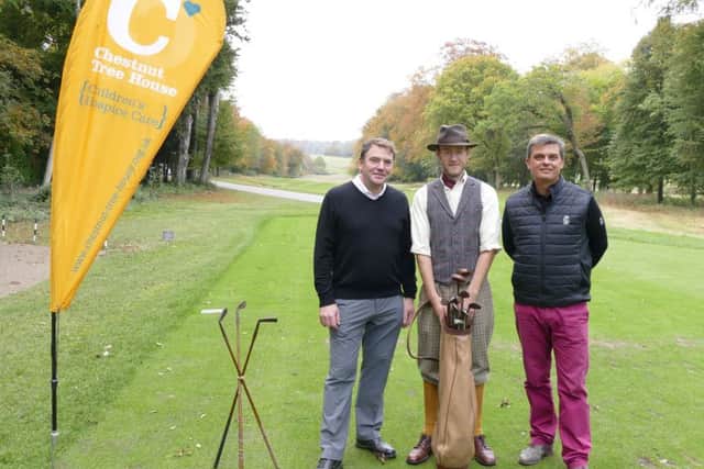 Chestnut Tree House chief executive Hugh Lowson, and Stuart Gillett, from Goodwood, with club professional Chris McDonnell dressed as course designer James Braid