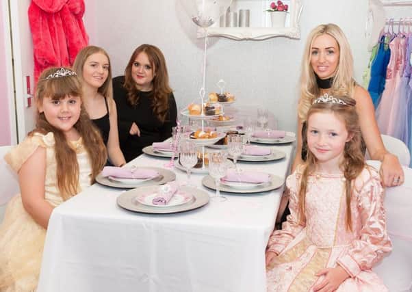 From left, Holly Williams, seven, Emma Sturdess, Laura Williams, Jenna Cook and Taylor-Belle Legg, seven, around the table where the children pamper parties will be held Picture: Keith Woodland (161488-014)
