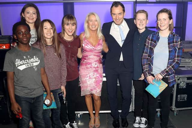 Alex Hannard, second right, with Jude Law and Paul Newman's daughter Clea, centre, and other youngsters at The Roundhouse Picture: Mike Marsland/WireImage
