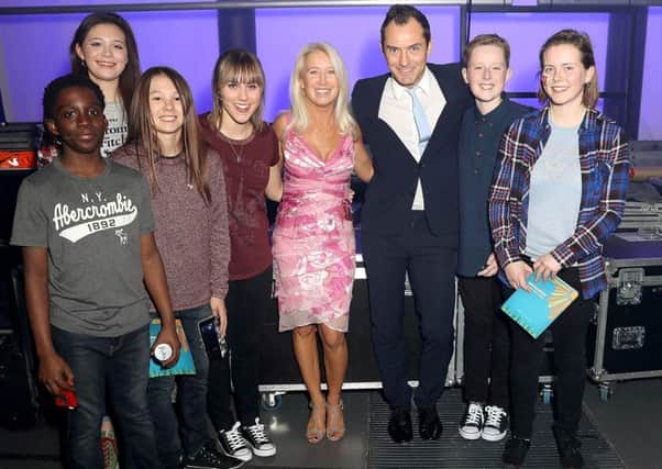 Alex Hannard, second right, with Jude Law and Paul Newman's daughter Clea, centre, and other youngsters at The Roundhouse Picture: Mike Marsland/WireImage