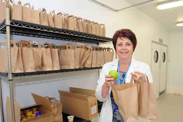 Dr Denise Thomas, head of dietetics, with some of the lunch bags.Picture: Sarah Standing (161397-4011)