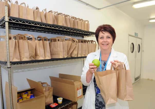 Dr Denise Thomas, head of dietetics, with some of the lunch bags.

Picture: Sarah Standing (161397-4011)