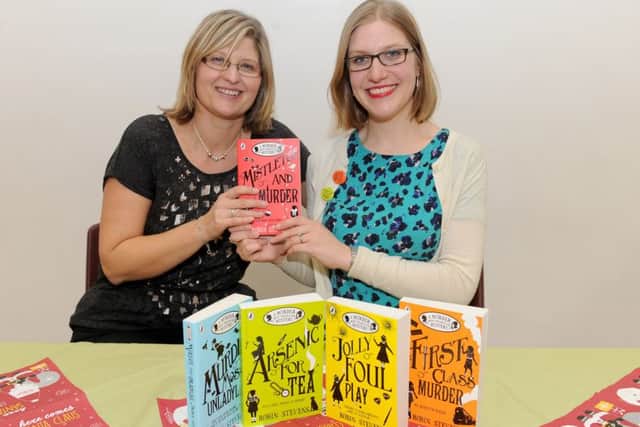 Author Robin Stevens  with, left, Purbrook Junior School librarian Lisa Wiltshire (161512-1314)