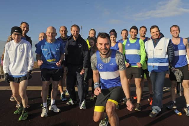News' sports writer David Brawn and friends before the start of Southsea parkrun on Saturday.  Picture Ian Hargreaves (161278-7)