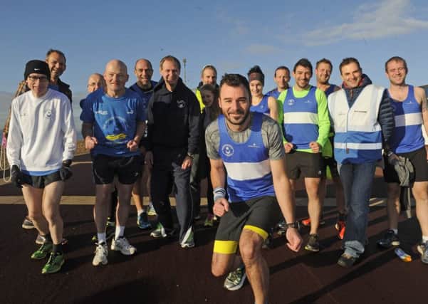 News' sports writer David Brawn and friends before the start of Southsea parkrun on Saturday.  Picture Ian Hargreaves (161278-7)