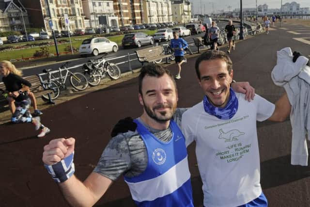 News' sports writer David Brawn with Dan Del Piccolo after the run. Picture: Ian Hargreaves