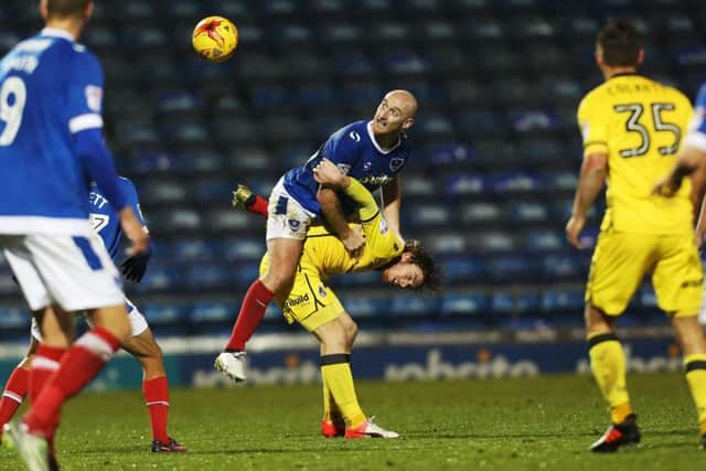 Drew Talbot wins the ball in the air for Pompey against Bristol Rovers. Picture: Joe Pepler