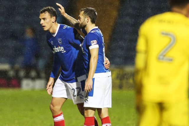 Pompey goal-hero Kal Naismith is congratulated by Milan Lalkovic. Picture: Joe Pepler