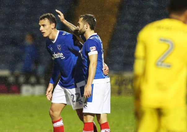 Pompey goal-hero Kal Naismith is congratulated by Milan Lalkovic. Picture: Joe Pepler