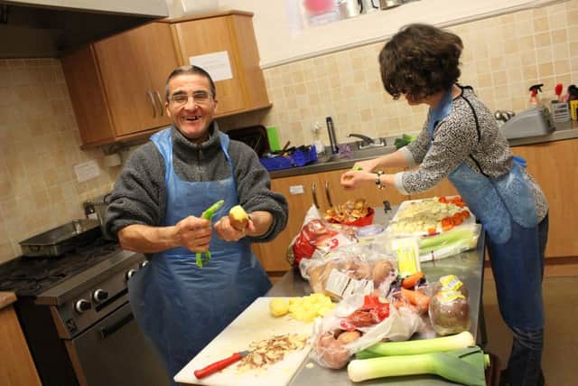 Gary, one of the cooking team, helping to prepare lunch at Breakthru.