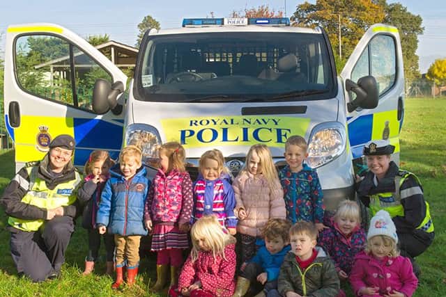 The Royal Navy Police on their visit to Woodentots Nursery