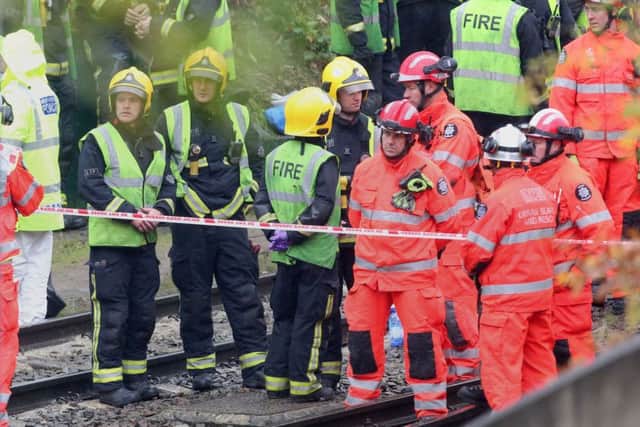 The scene after a tram overturned in Croydon, south London. Picture: Steve Parsons/PA Wire
