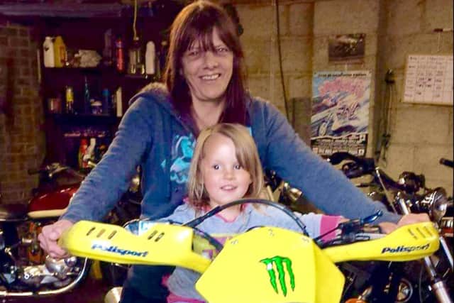Julie Corben with her grandaughter Maisie in 2013