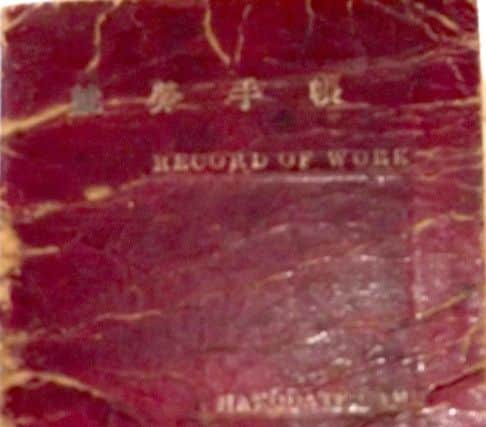Bill Marshall's record-of-work and pay book while a Japanese prisoner-of-war.