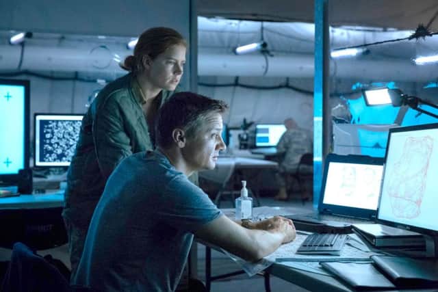 Louise Banks (Amy Adams) and Ian Donnelly (Jeremy Renner). PA Photo/Paramount Pictures/Jan Thijs.
