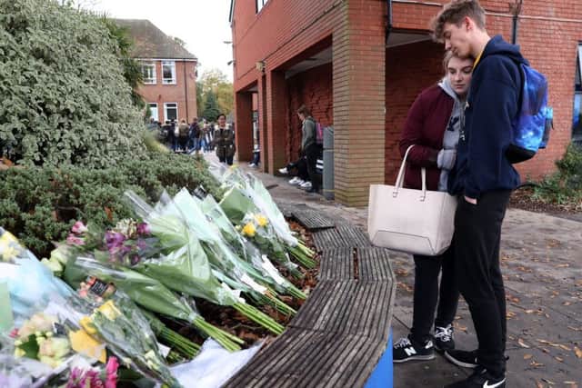 Floral tributes left to the two girls. Photo credit: Andrew Matthews/PA Wire