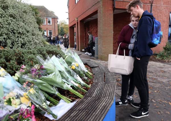 Floral tributes left to the two girls. Photo credit: Andrew Matthews/PA Wire