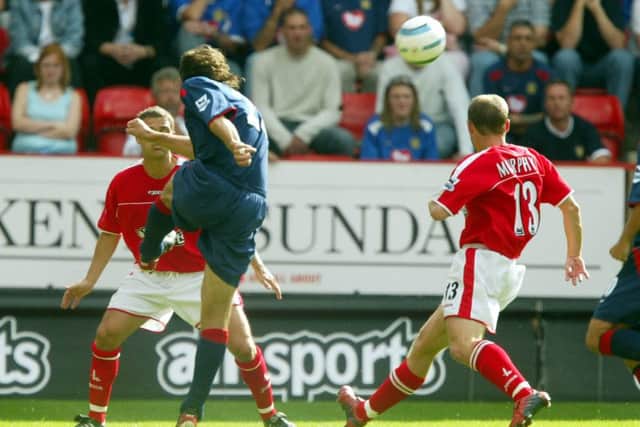 Patrik Berger scores against Charlton in 2004