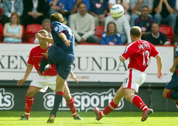 Patrik Berger scores against Charlton in 2004