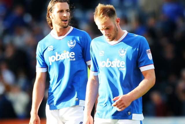Christian Burgess, left, with Matt Clarke Picture: Joe Pepler