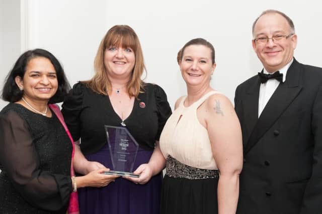 The team from the University of Portsmouth Dental Academy and their award for Dental Practice of the Year. Picture: Keith Woodland
