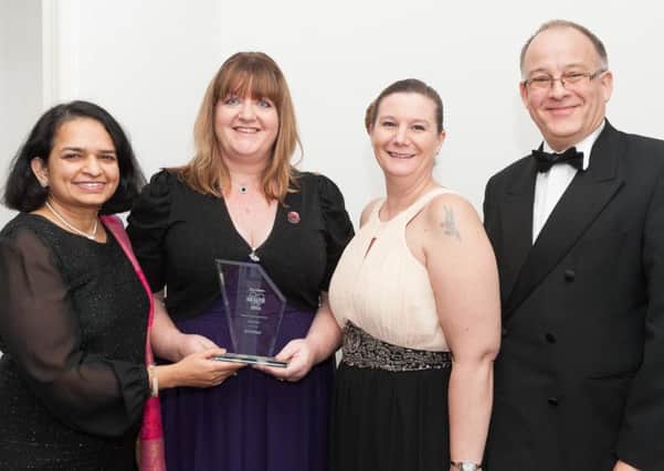 The team from the University of Portsmouth Dental Academy and their award for Dental Practice of the Year. 

Picture: Keith Woodland