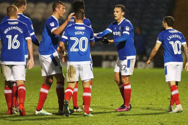 Kal Naismith, right, celebrates his goal against Bristol Rovers with his team-mates Picture: Joe Pepler