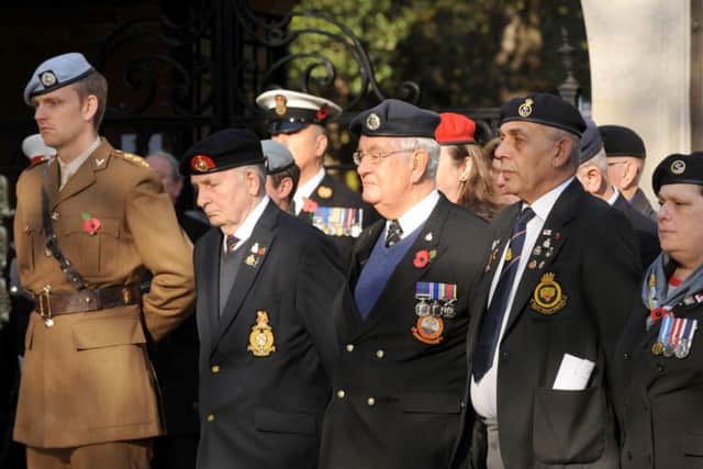 Veterans at the war memorial in Portsmouth Picture: Sarah Standing (161553-6470)