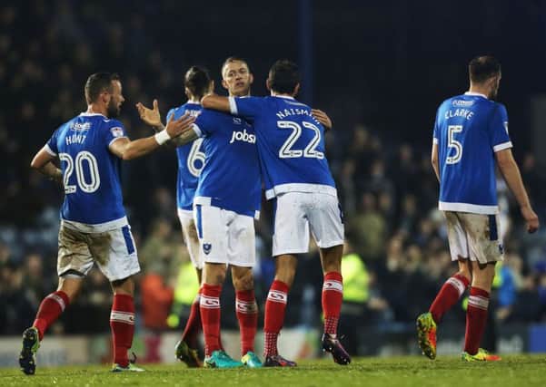 Carl Baker celebrates scoring his second - and Pompey's fourth - against Mansfield at Fratton Park Picture: Joe Pepler