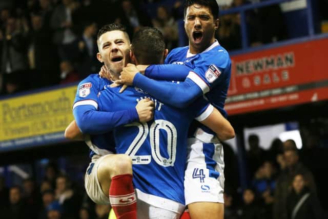 Noel Hunt, centre, celebrates his goal with Conor Chaplin and Danny Rose Picture: Joe Pepler