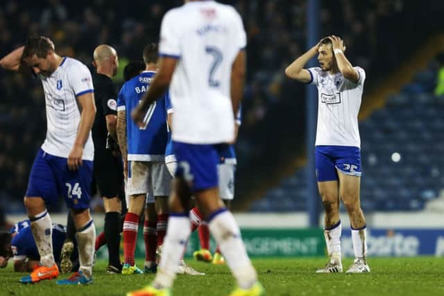 Alex Iacovitti, far right, was the second man to see red for Mansfield in yesterday's 4-0 defeat to Pompey at Fratton Park Picture: Joe Pepler