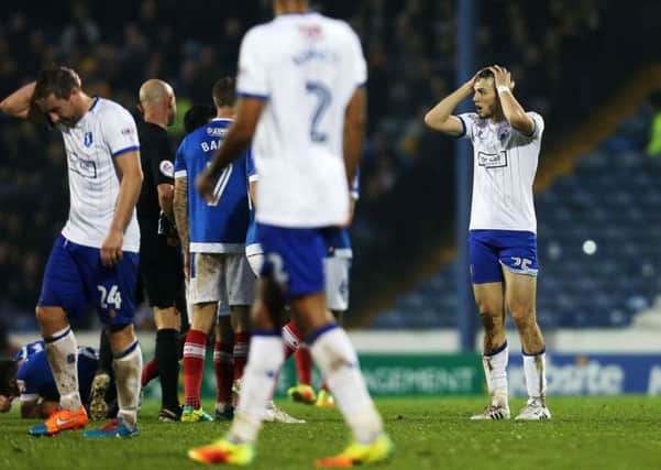 Alex Iacovitti, far right, was the second man to see red for Mansfield in yesterday's 4-0 defeat to Pompey at Fratton Park Picture: Joe Pepler