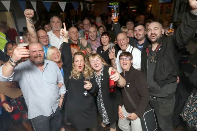Raising a glass to raise funds, George Newton, Loraine Stanley and John Blundell with the rest of the fundraisers for Lennon Beech Picture: Habibur Rahman
