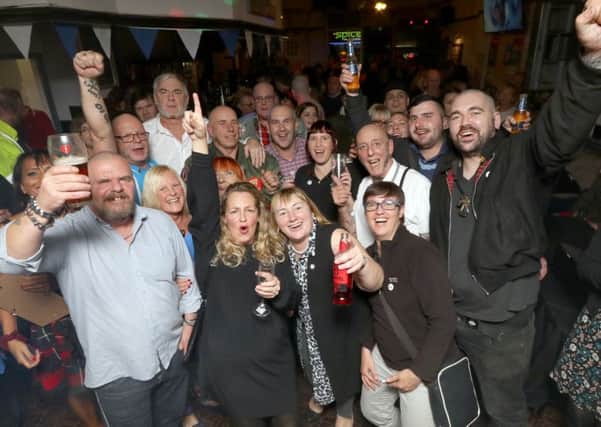Raising a glass to raise funds, George Newton, Loraine Stanley and John Blundell with the rest of the fundraisers for Lennon Beech Picture: Habibur Rahman